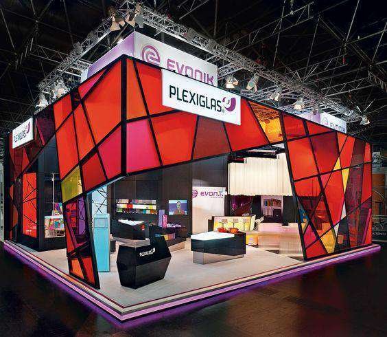 Custom exhibition stand with branded walls and visitor meeting space